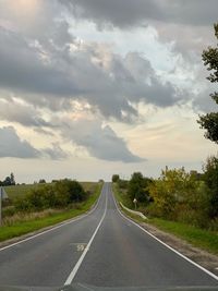 Empty road along landscape