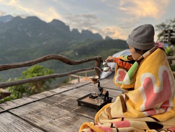 Tourists making coffee using a kettle