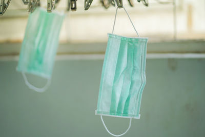 Close-up of a bottle hanging on table