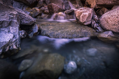 Stream flowing through rocks