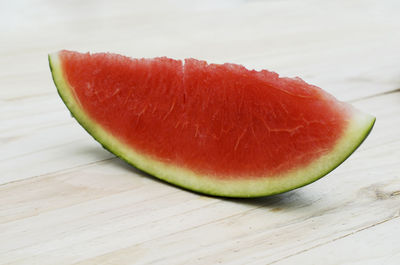 Delicious sliced watermelon on wooden table backgrounds