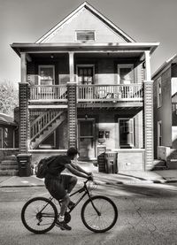 Man with bicycle in city