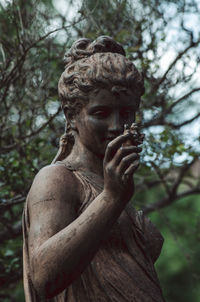 Close-up of angel statue in park