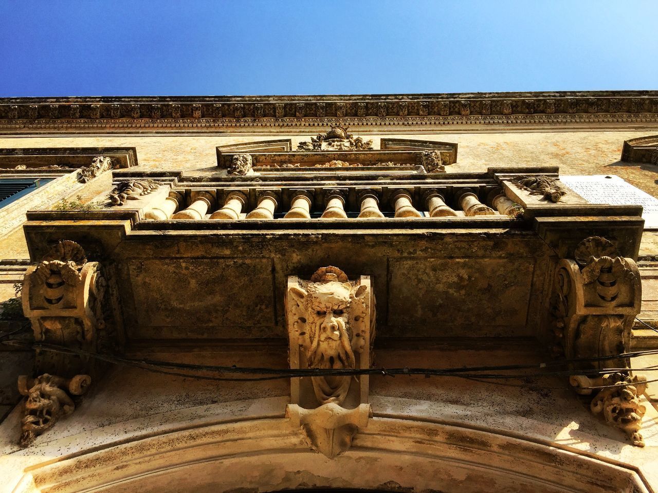 STATUES IN OLD BUILDING