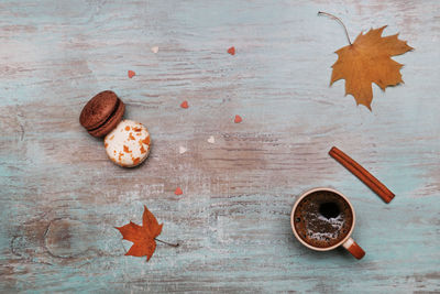 High angle view of maple leaves on table