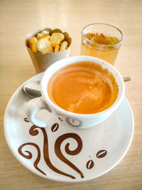 High angle view of coffee on table