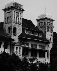 Low angle view of old building against sky