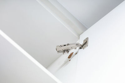 High angle view of electric lamp on wall at home