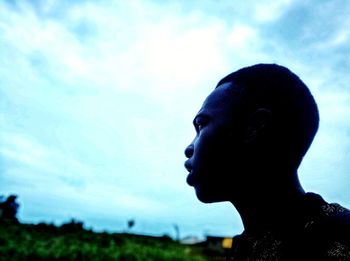 Low angle view of man against sky