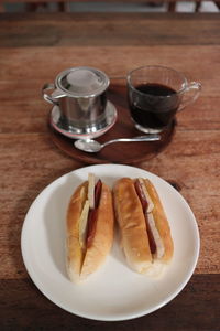 Coffee and breakfast on table