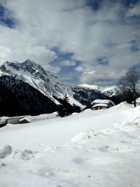 Scenic view of snow covered mountains