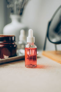 Close-up of beauty products on table