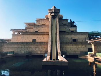Low angle view of building against blue sky