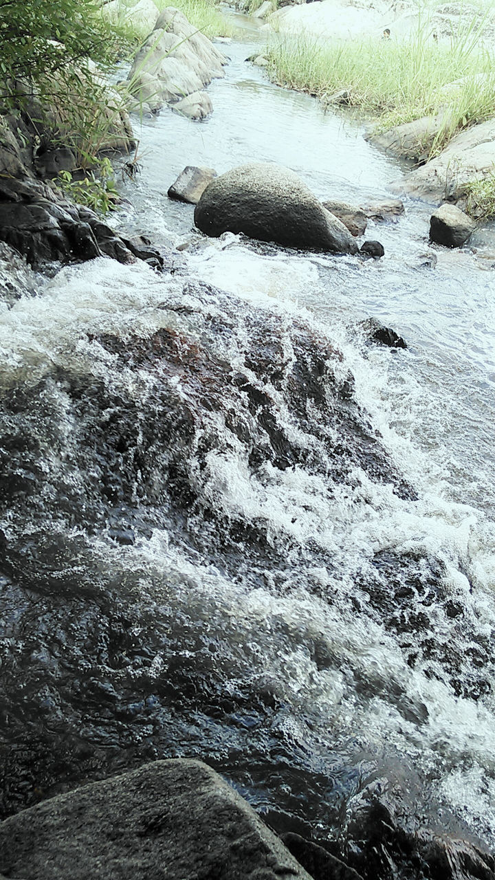 water, nature, flowing water, river, high angle view, stream, rock - object, tranquility, beauty in nature, flowing, day, tranquil scene, scenics, outdoors, no people, motion, surf, sunlight, wet, forest