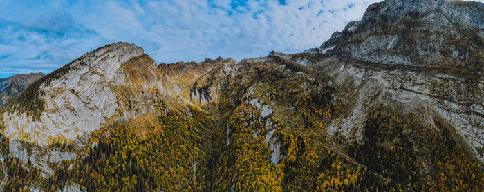 Low angle view of rock formation against sky