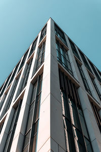 Low angle view of modern building against clear sky