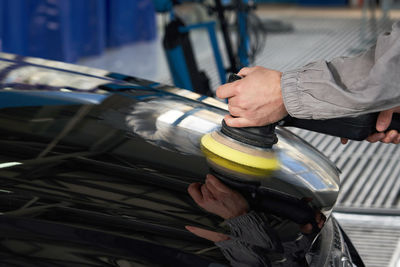 Man working in car