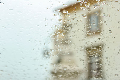 Full frame shot of wet glass window