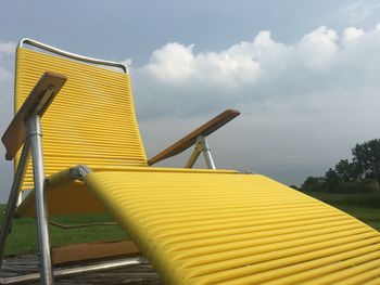 Yellow structure against sky