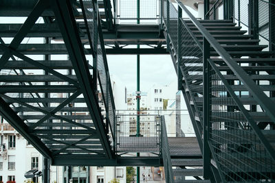 Modern bridge against sky in city