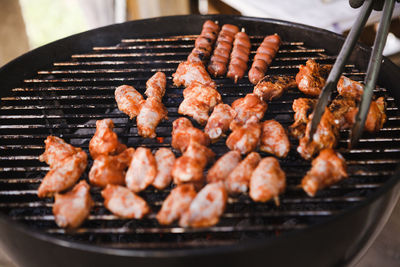 Close-up of meat on barbecue grill