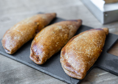 Close-up of bread on cutting board