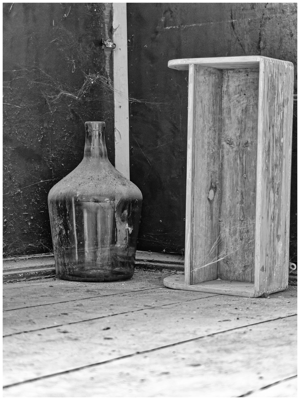 transfer print, black and white, wood, auto post production filter, container, still life photography, no people, iron, monochrome photography, bottle, old, day, still life, painting, monochrome, glass, architecture, indoors
