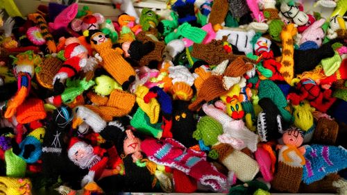High angle view of colorful finger puppets