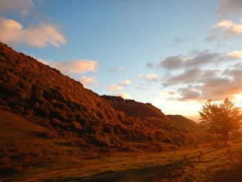 Scenic view of mountains against sky during sunset