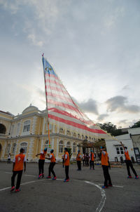 Group of people in front of building