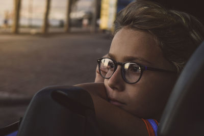 Portrait of young woman wearing sunglasses