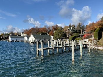 Panoramic view of building by sea against sky