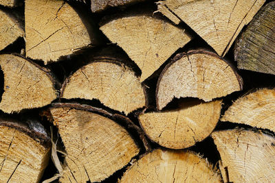 Stack of firewood prepared for winter. spruce wood.