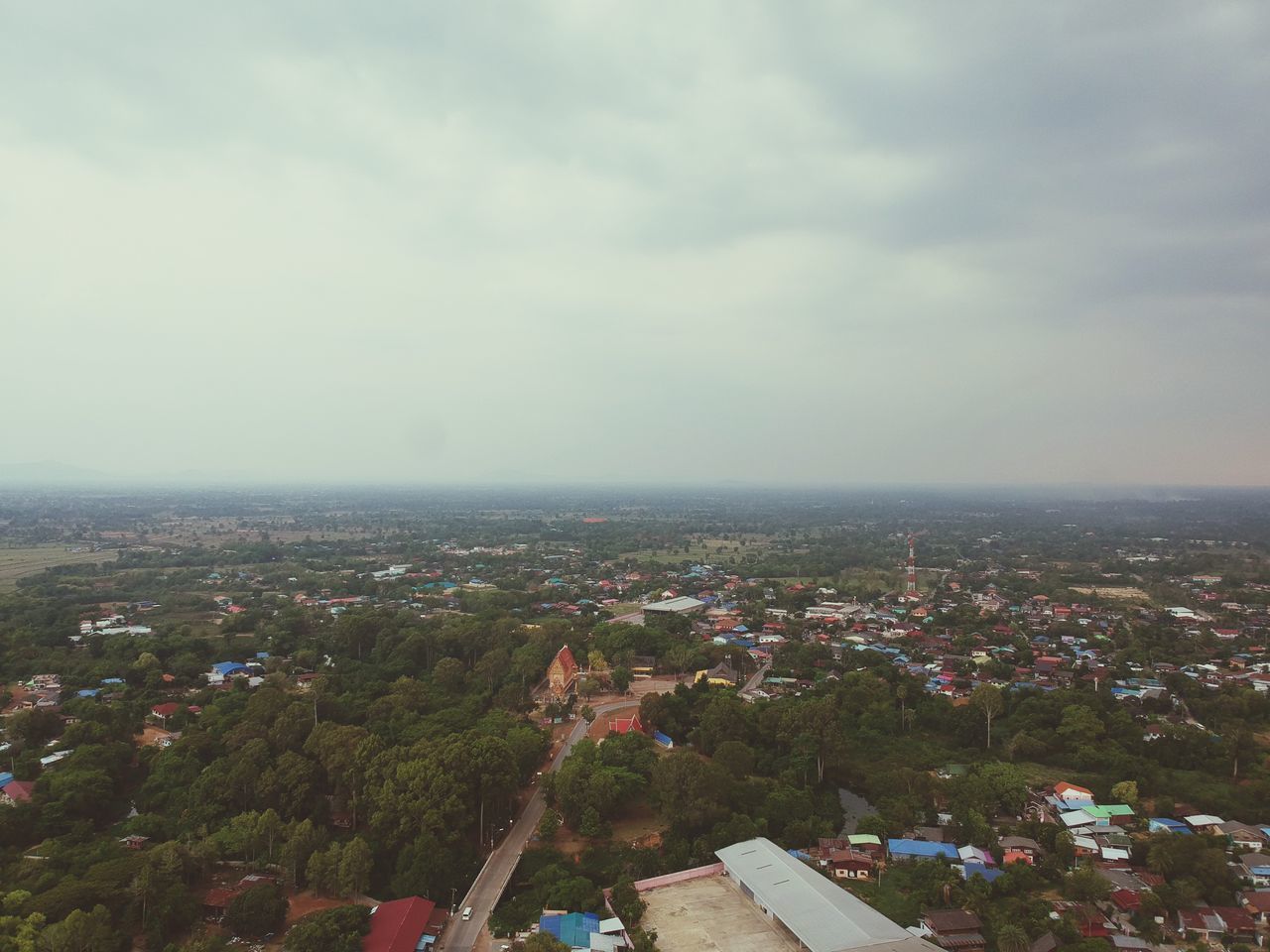 HIGH ANGLE VIEW OF BUILDINGS AGAINST SKY