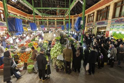 People at market stall