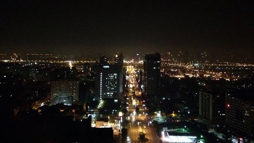 Illuminated cityscape at night