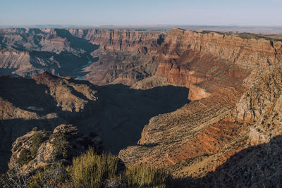 Aerial view of landscape with mountain range in background