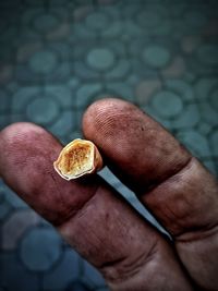 Close-up of man holding ice cream