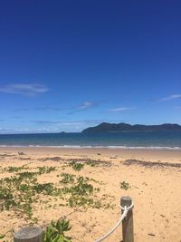 Scenic view of beach against clear sky