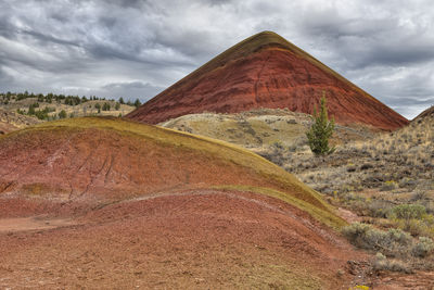 View of landscape against cloudy sky