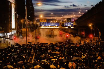 High angle view of people on street at night