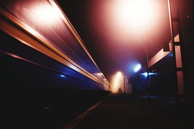 Light trails against sky at night