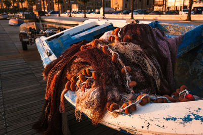 Fishing net in the port of taranto vecchia at dawn