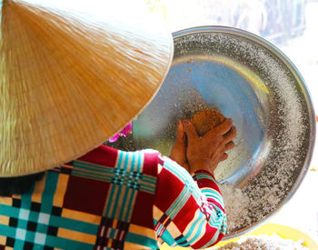 High angle view of hand processing of coconuts on the mekong delta.