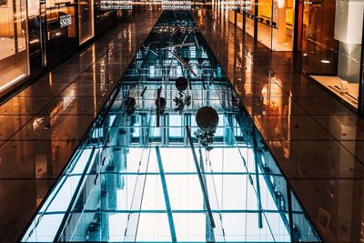 Reflection of people on glass window