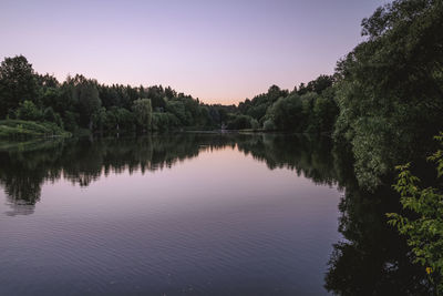 Scenic view of lake against sky during sunset