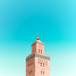 Low angle view of building against clear blue sky