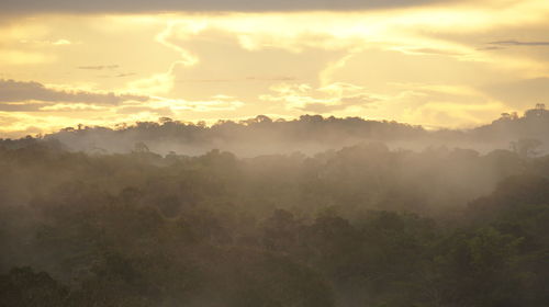 Scenic view of mountains against sky during sunset