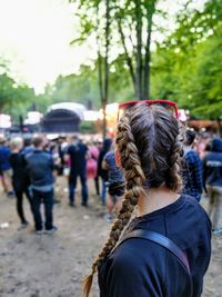 Woman standing on field during concert