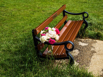 High angle view of chair in field